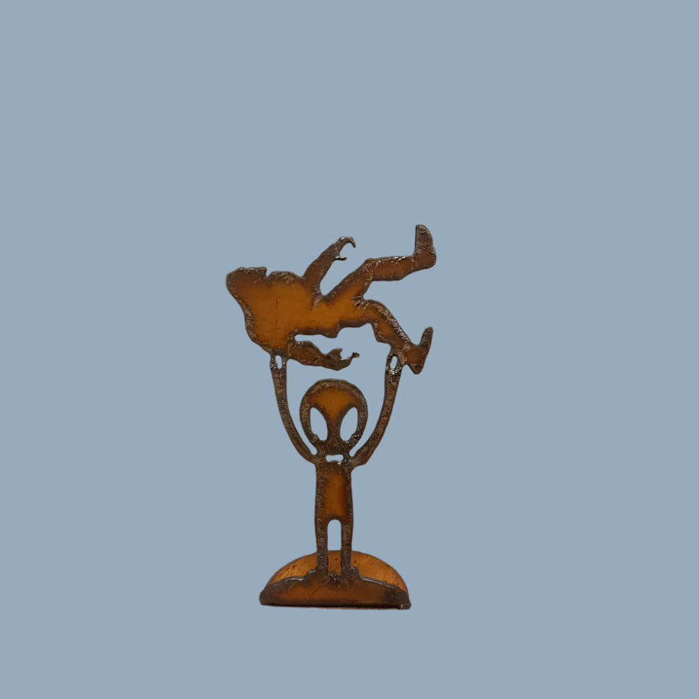 Alien Holding Bigfoot Rustic Metal Desk Top Figurine USA
