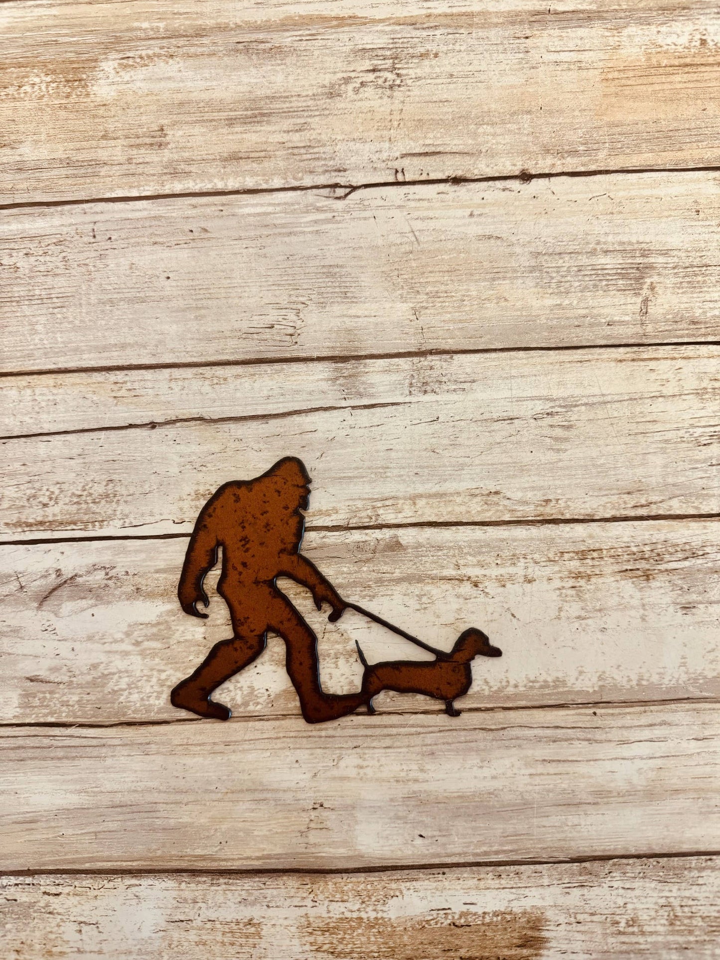 Bigfoot with Dachshund Yeti Sasquatch Rustic Metal Magnet